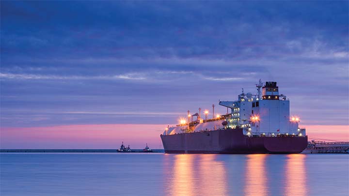 LNG TANKER - Sunrise over the sea gas terminal