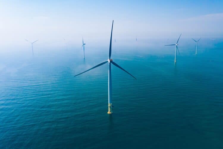 An aerial image of wind turbines in an offshore wind area